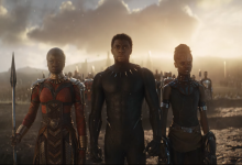 Black Panther warriors, including Shuri, standing in a field at sunset in Avengers: Endgame